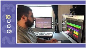 Game Audio: Interview with Theo Nogueira. The image showcases Audio Director Theo Nogueira working on the track 'From Shore to Clliff.'