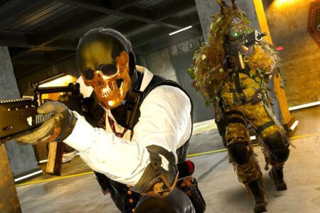 An operative with a golden skull mask next to another operative in Call of Duty Modern Warfare 3.