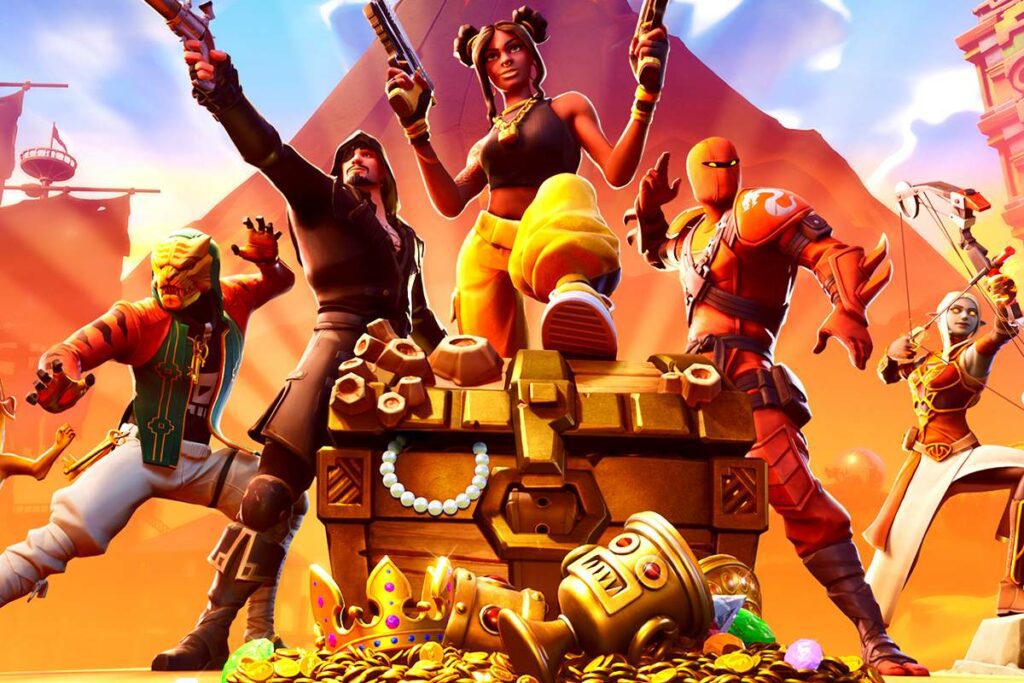 A bunch of armed players near a chest of gold and loot in Fortnite.