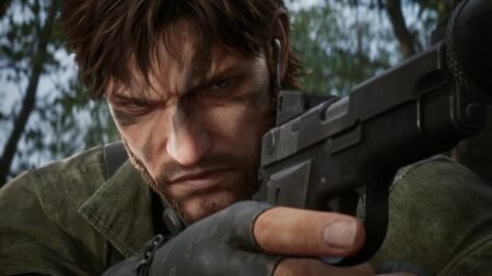 Naked Snake with a pistol in his hand looking to the right.