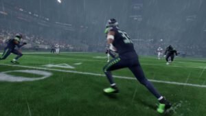 A Seahawks defender closes in on a Cardinals player during a rainy matchup in Madden NFL 26