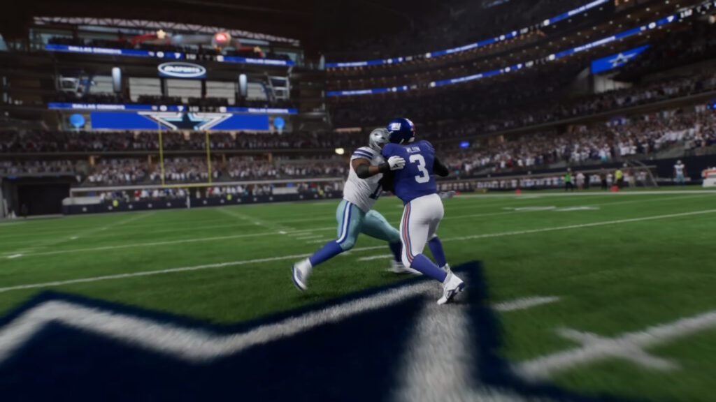 A Cowboys player battles a Giants defender along the sideline in Madden NFL 26