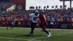 A player tackling the ball carrier in Madden NFL 26
