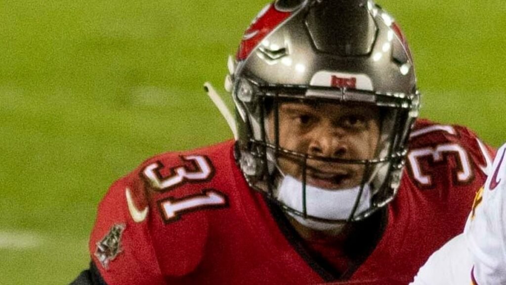 Antoine Winfield Jr playing football