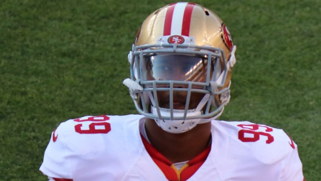 DeForest Buckner playing football