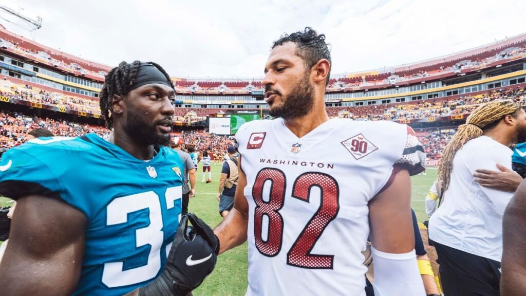 Devin Lloyd and Logan Thomas playing football