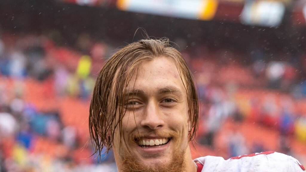 George Kittle playing football