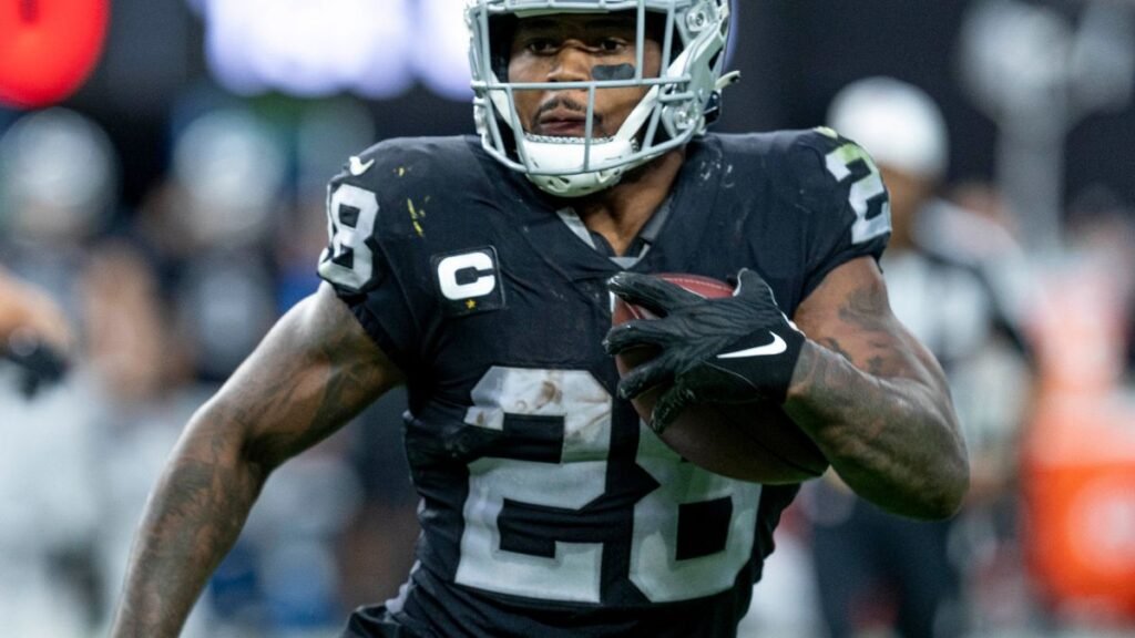 Josh Jacobs playing football