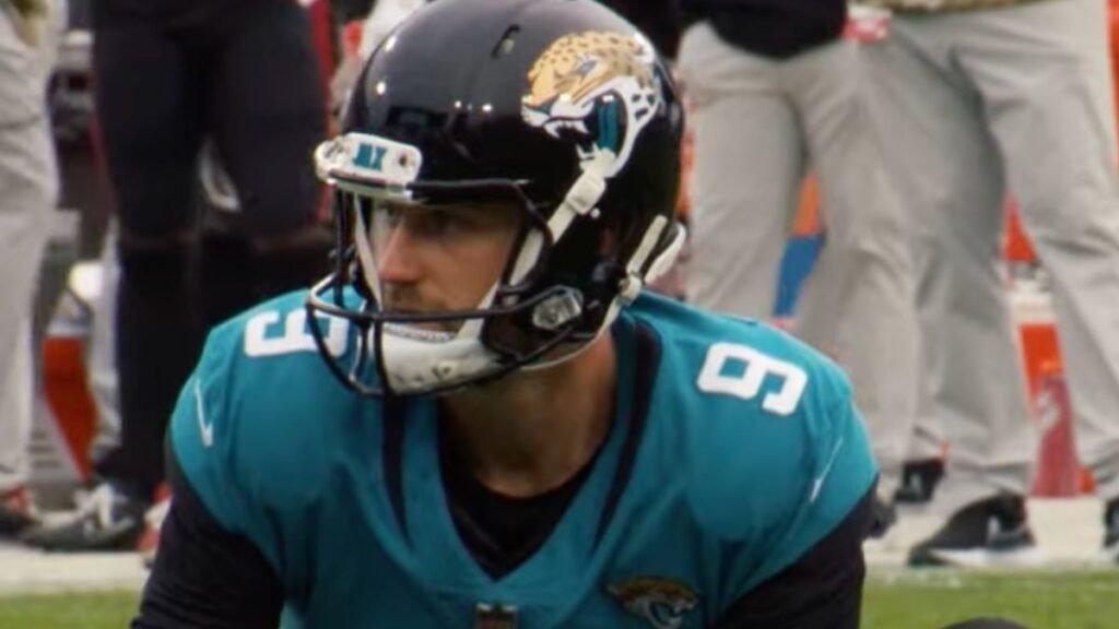 Logan Cooke playing football