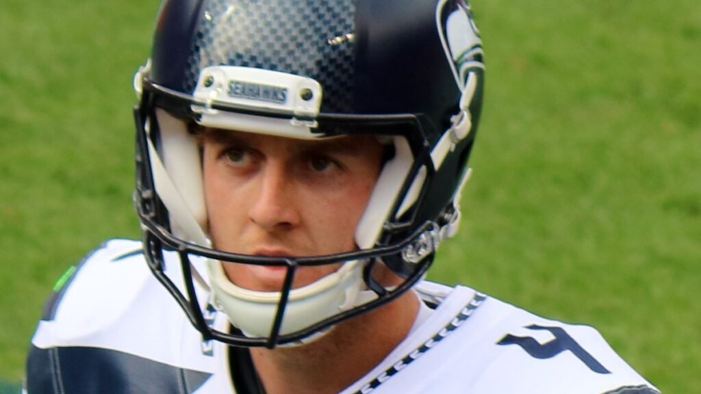 Michael Dickson playing football