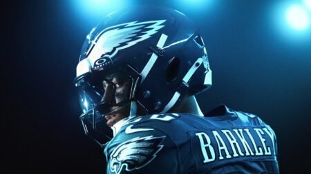 Saquon Barkley, a running back from the Philadelphia Eagles looking back at the camera in Madden 26
