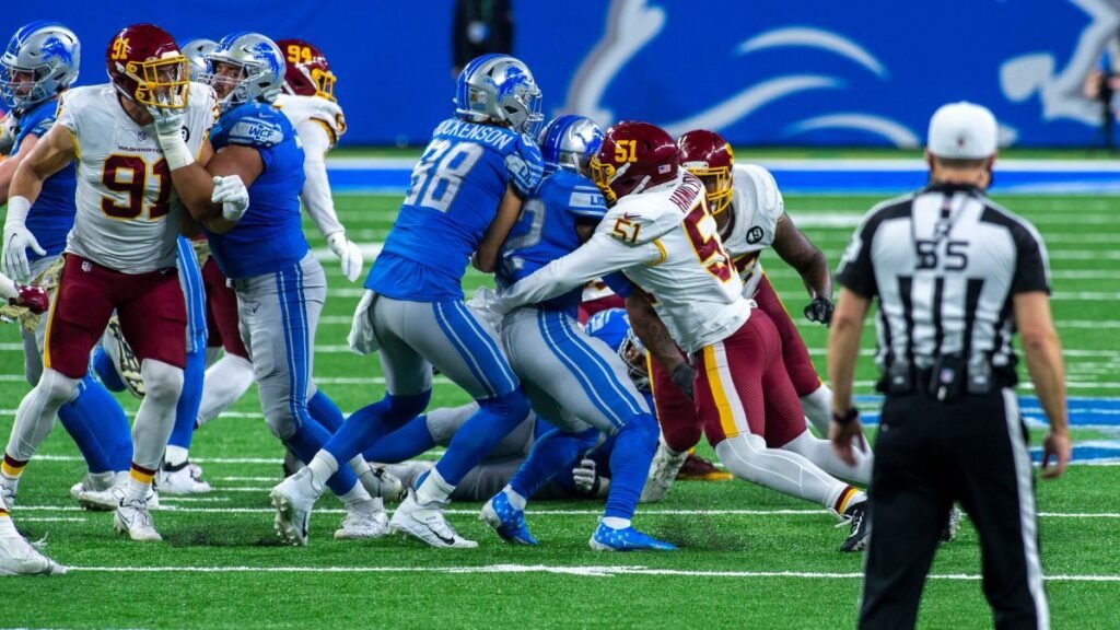 TJ Hockenson playing football
