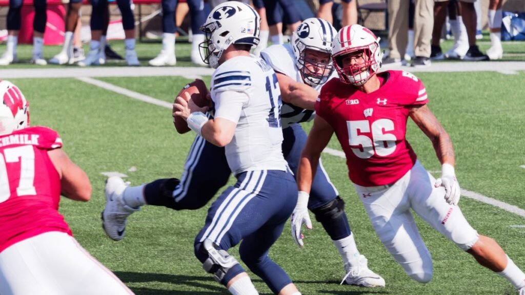 Zack Baun playing Football