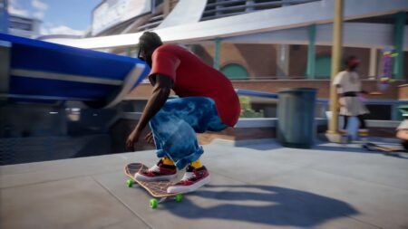 A Skate player crouching on their skateboard
