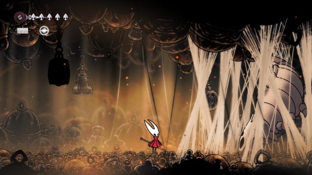How To Unlock Fast Travel In Hollow Knight: Silksong | Hollow Knight: Silksong | GamesHorizon A screenshot of Bell Beast held by silk in Hollow Knight Silksong