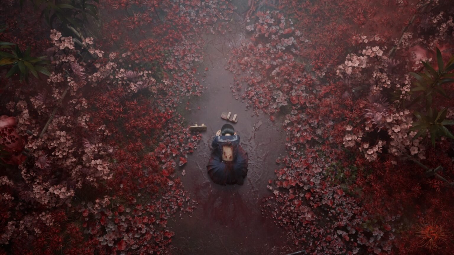 A screenshot of the protagonist bowing down in the middle of the field in Silent Hill F