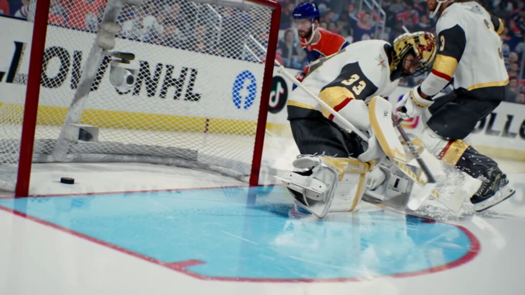 Two hockey players battling in the goal line in NHL 26