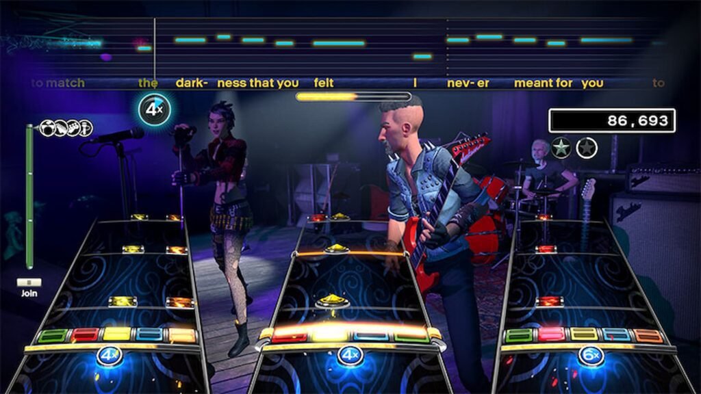 An image of a band playing instrucments while the player tries too in Rockband