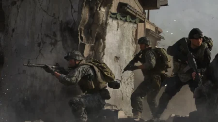 Image of Modern Warfare 4 characters taking cover next to partly destroyed building wall