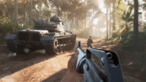 Image of Hell Let Loose Vietnam players standing next to tank moving through jungle