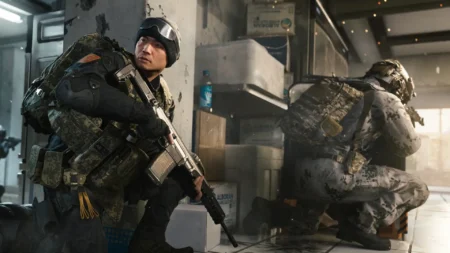 Image of MW4 player taking cover while holding assault rifle