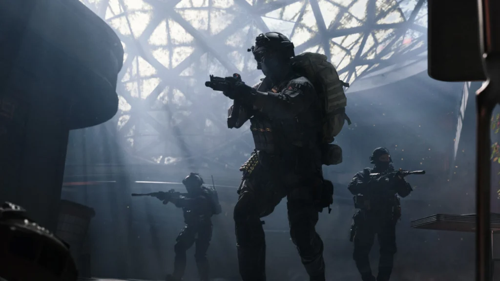 Image of Modern Warfare 4 soldiers moving through dark building holding assault rifles